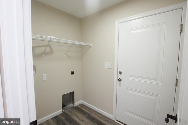 laundry area with dark wood-type flooring and hookup for an electric dryer