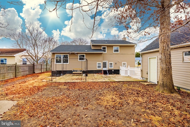 back of property with a patio