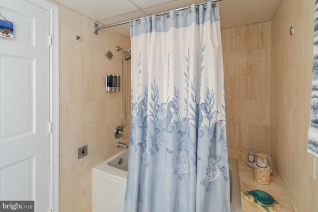 bathroom with shower / bathtub combination with curtain