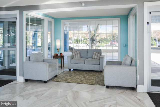 living room featuring a healthy amount of sunlight