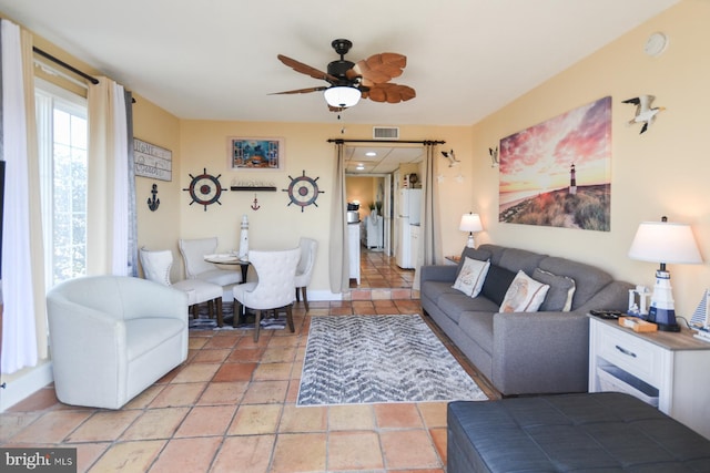 living room with ceiling fan