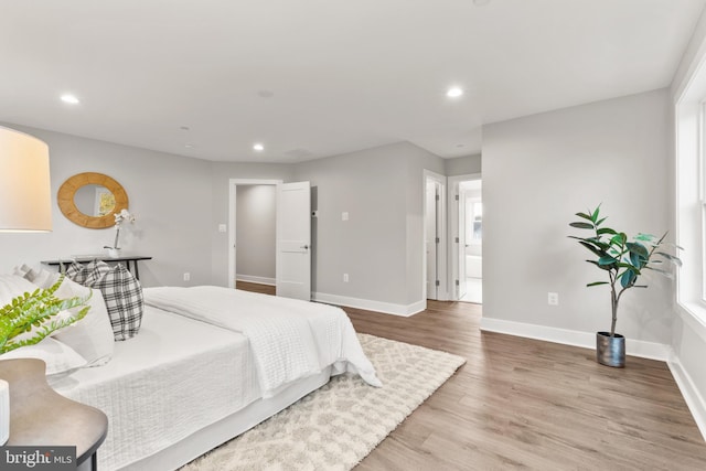 bedroom featuring hardwood / wood-style flooring