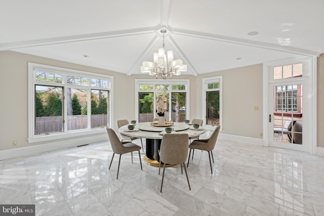 dining space featuring lofted ceiling with beams and a notable chandelier