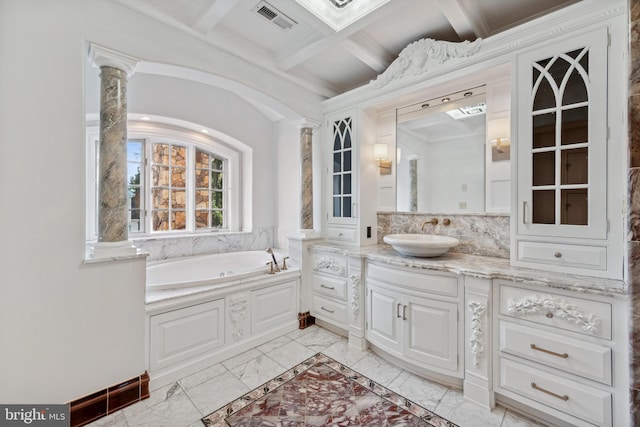 bathroom featuring vanity, beamed ceiling, decorative columns, and coffered ceiling