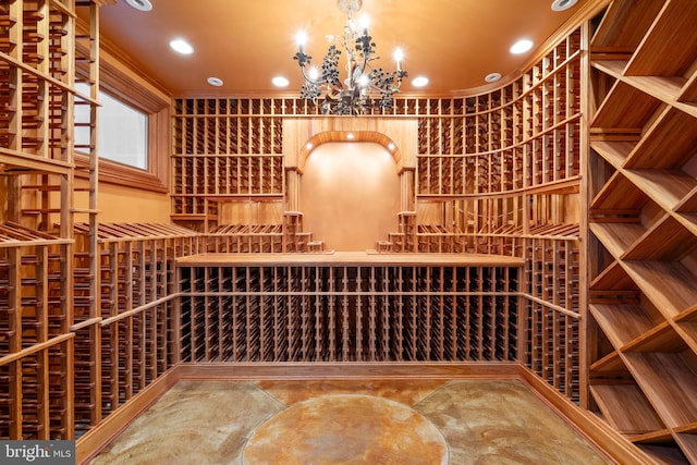 wine cellar featuring a notable chandelier