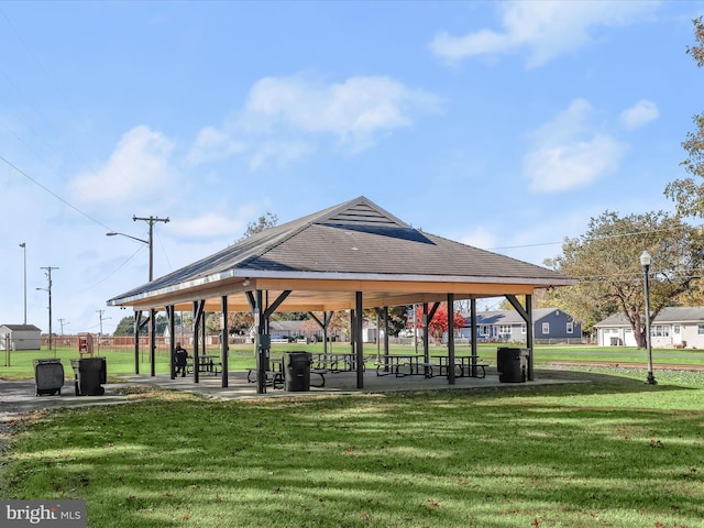 view of community featuring a lawn and a gazebo