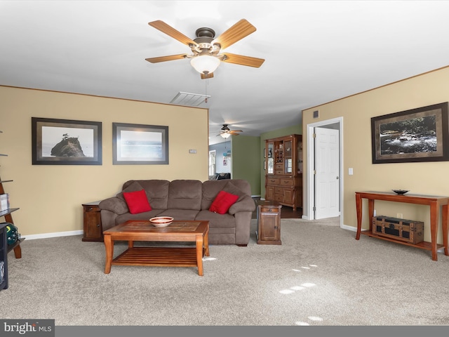 living room with carpet and ceiling fan