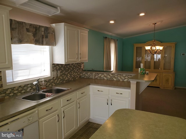 kitchen with dishwasher, hanging light fixtures, sink, a notable chandelier, and white cabinets