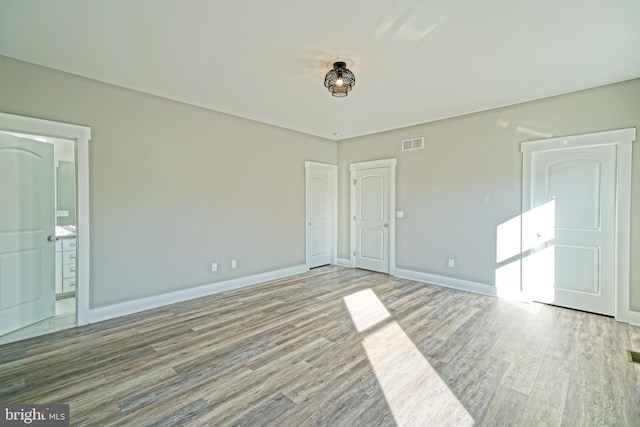 empty room featuring light hardwood / wood-style flooring