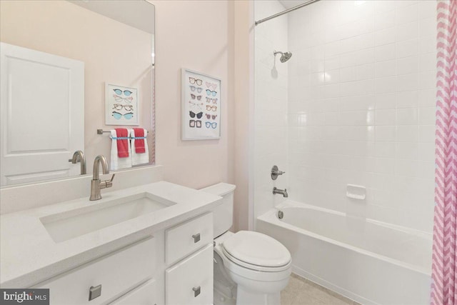 full bathroom featuring vanity, shower / bath combo, and toilet