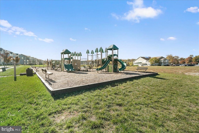 view of playground featuring a lawn