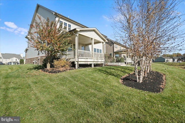 exterior space with a yard and a porch