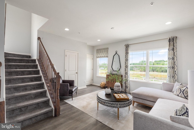 living room with stairs, wood finished floors, recessed lighting, and baseboards