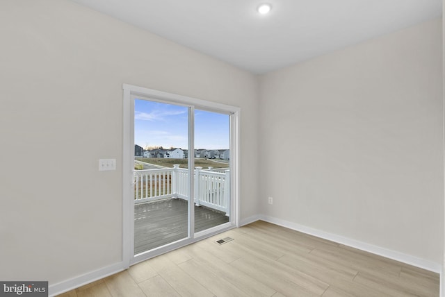 empty room featuring light hardwood / wood-style flooring