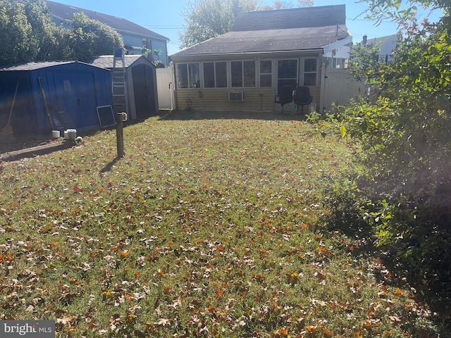 view of yard featuring a storage unit