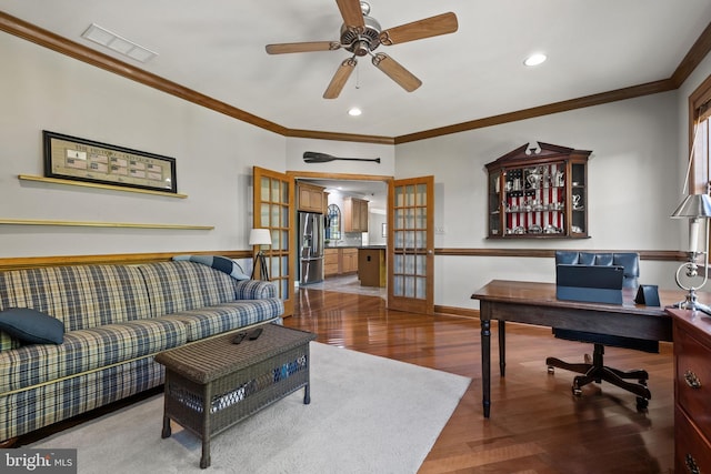 office area with hardwood / wood-style floors, crown molding, french doors, and ceiling fan