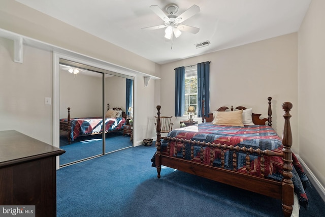 carpeted bedroom featuring a closet and ceiling fan