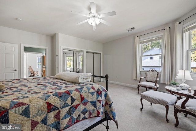 carpeted bedroom featuring ceiling fan