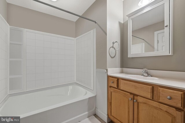 bathroom featuring vanity and shower / washtub combination