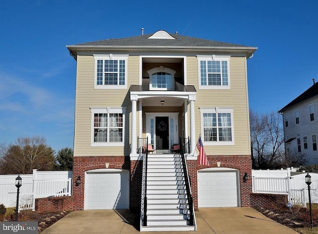 view of front of property with a garage