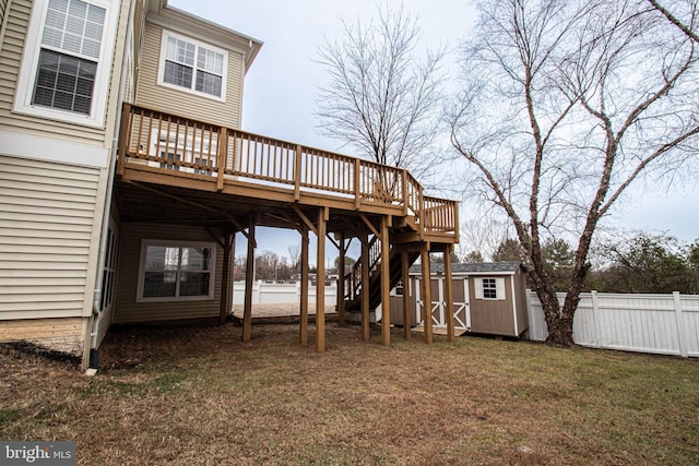 exterior space with a shed and a wooden deck