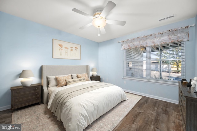 bedroom featuring hardwood / wood-style floors and ceiling fan