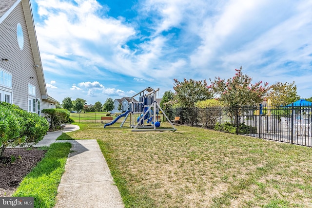 view of play area with a yard