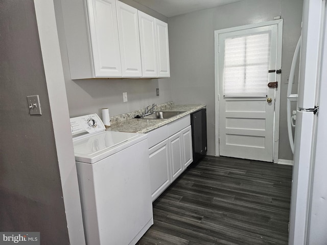 laundry area featuring washer / dryer, dark hardwood / wood-style floors, and sink