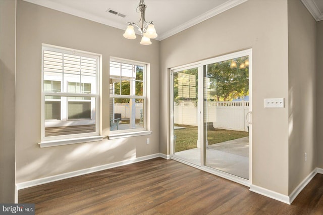 doorway to outside with crown molding, a notable chandelier, and dark hardwood / wood-style flooring