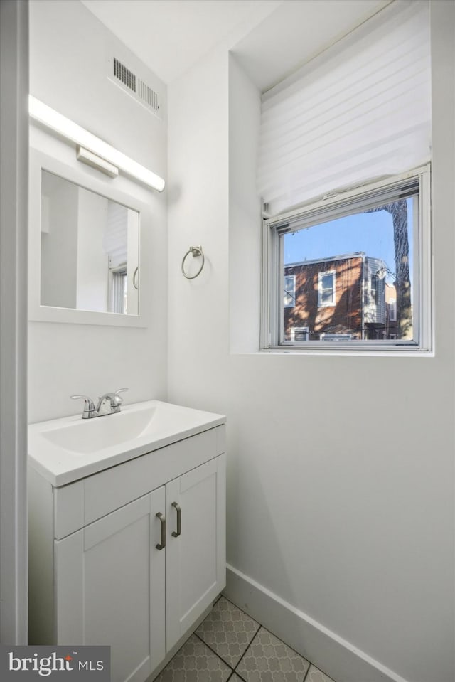 bathroom featuring vanity and tile patterned floors