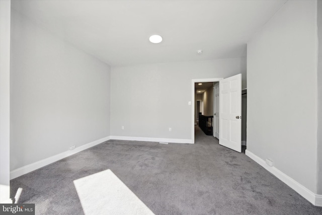 unfurnished bedroom featuring carpet