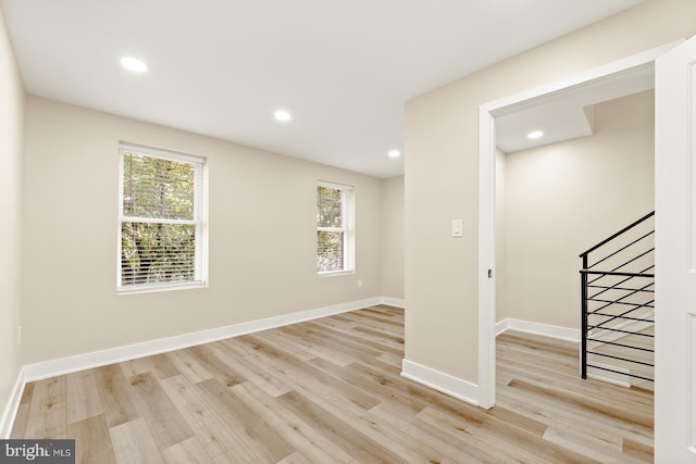 basement featuring light hardwood / wood-style floors