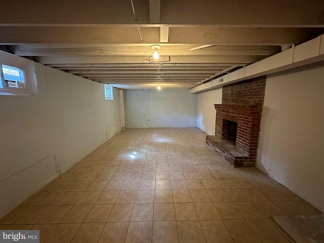 basement featuring a fireplace