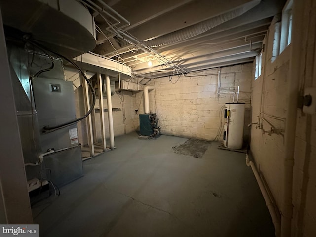 basement featuring electric water heater and heating unit