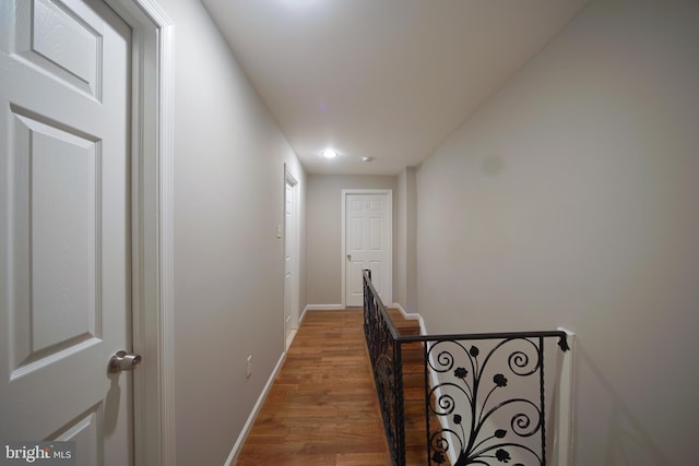 hallway featuring hardwood / wood-style floors