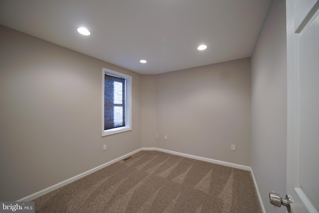 empty room featuring carpet floors