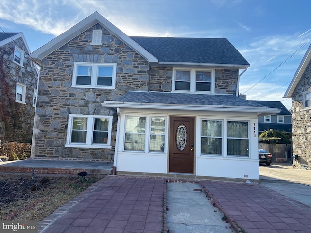 view of front of property with a patio