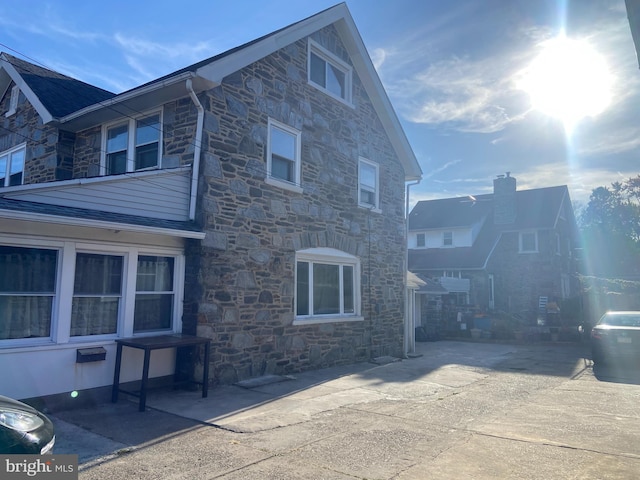 view of home's exterior featuring a patio area