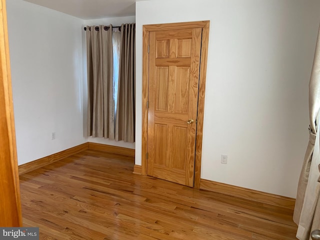 unfurnished bedroom featuring light hardwood / wood-style flooring