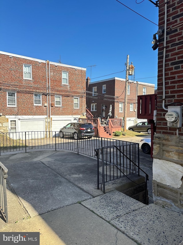 view of patio featuring a garage