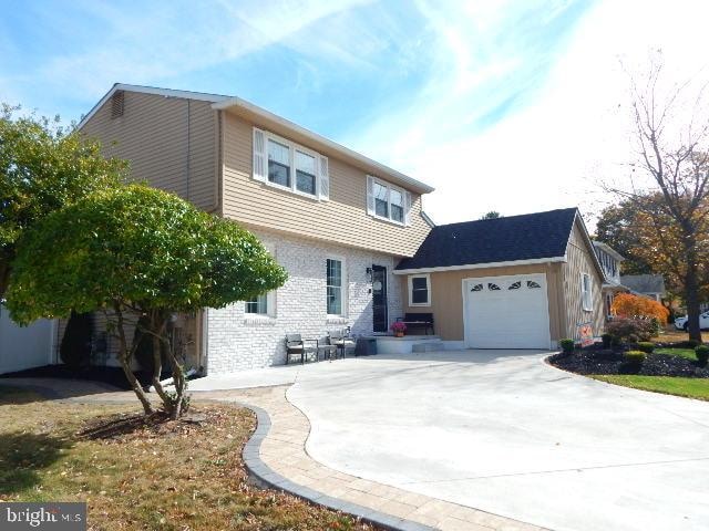 view of property featuring a garage