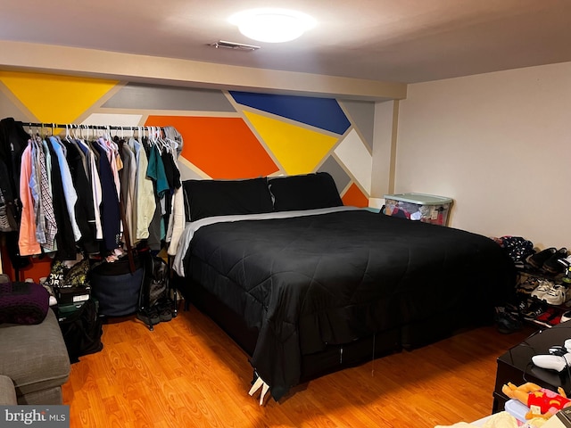 bedroom featuring light hardwood / wood-style floors