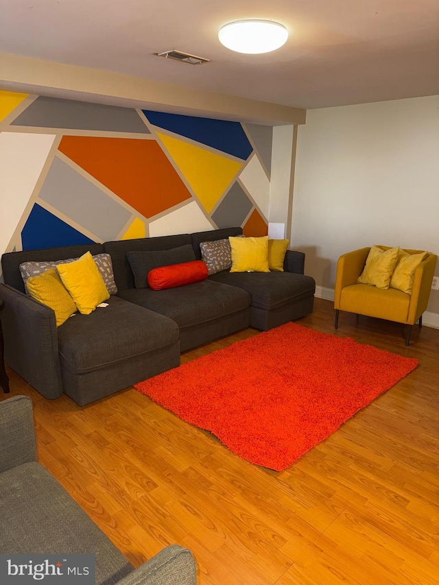 5437 Force Rd, Baltimore, MD 21206 - living area with wood finished floors and baseboards