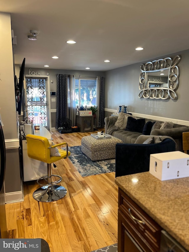 5437 Force Rd, Baltimore, MD 21206 - living room with wood finished floors, recessed lighting, and baseboards