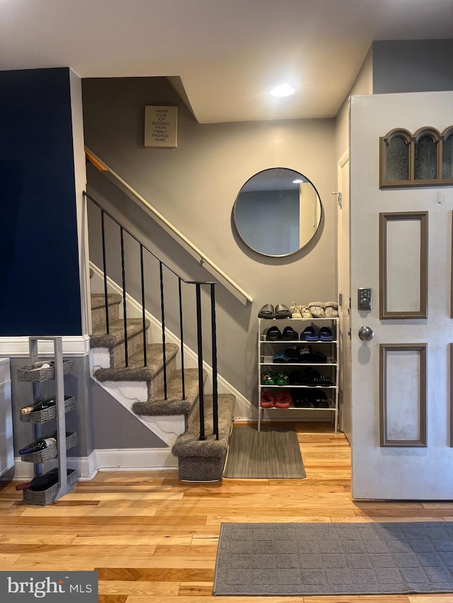 5437 Force Rd, Baltimore, MD 21206 - entrance foyer with wood finished floors, stairway, and baseboards