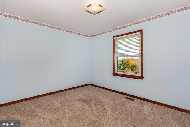 view of carpeted spare room