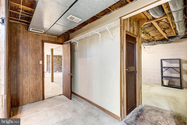 basement with wood walls