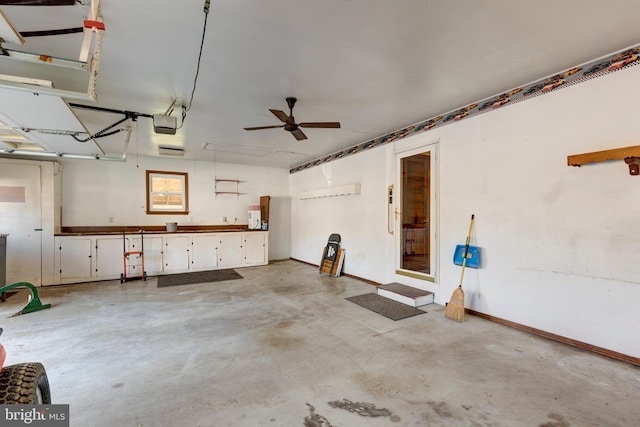 garage featuring a garage door opener and ceiling fan