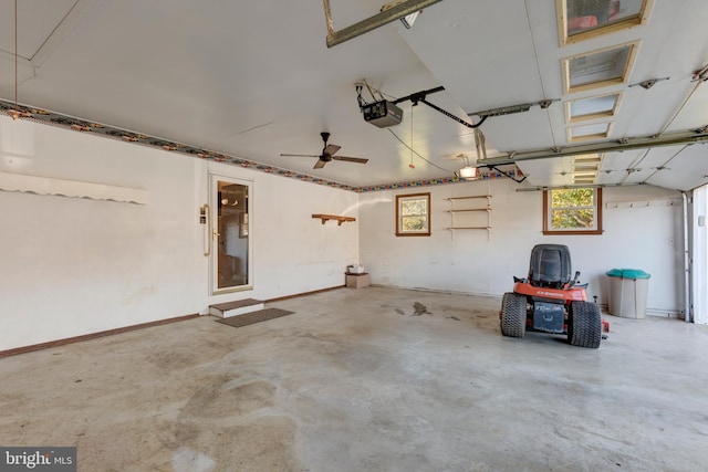 garage featuring ceiling fan and a garage door opener