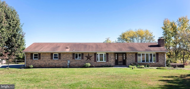 ranch-style house with a front yard